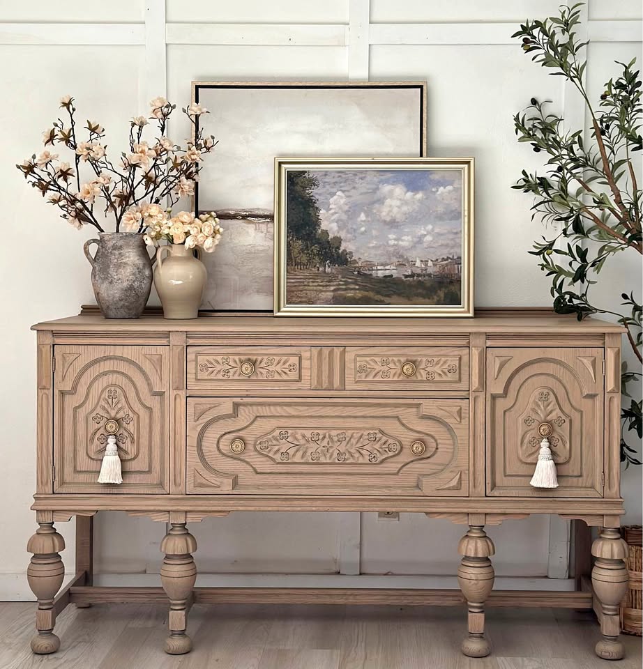 Jacobean oak sideboard with carved floral panels and turned legs restored by White Oak Finishes